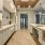 a kitchen with white cabinets