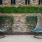 a chair and a planter outside