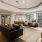 a large living room with a large glass wall